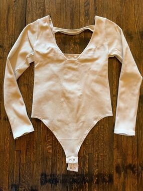 Anthropologie — Long Sleeve Cutout Bodysuit — size L/XL — great used condition